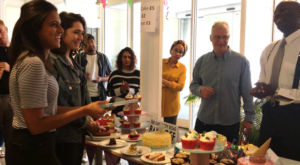 NBBJ Bake Off crowd round a table