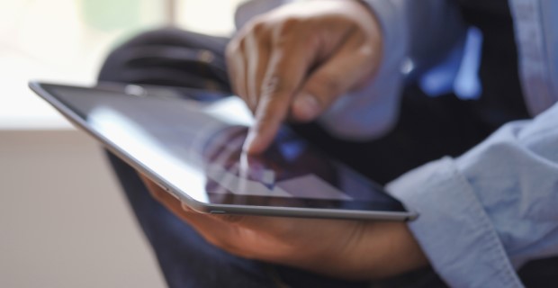 Man using a tablet computer
