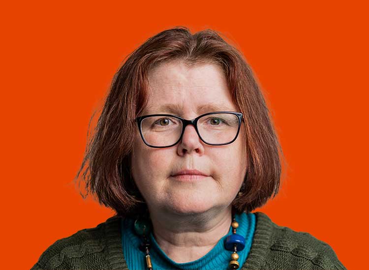 Co-production partner Jo with brown bobbed hair and glasses