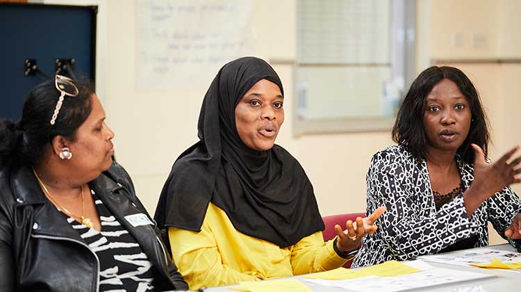 Three women taking part in a discussion at a Middlesbrough collaboration event