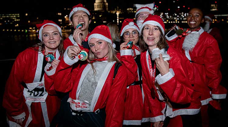 Event participants dressed as santas